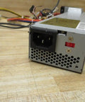 185W PFC DC Switching Power Supply For Biz PCs And Workstations Refurbished 308439-001, rear view with 3-prong inlet and wires