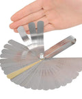Stainless steel feeler gauge set from Guitar And Bass Setup Pro Tool Kit With 32 Blade Stainless Feeler Gauge Dual Metric And Imperial Markings Radius Gauges Understring Radius Guide Luthier Tools And String Action Ruler For Precise Fretboard And Neck Setup