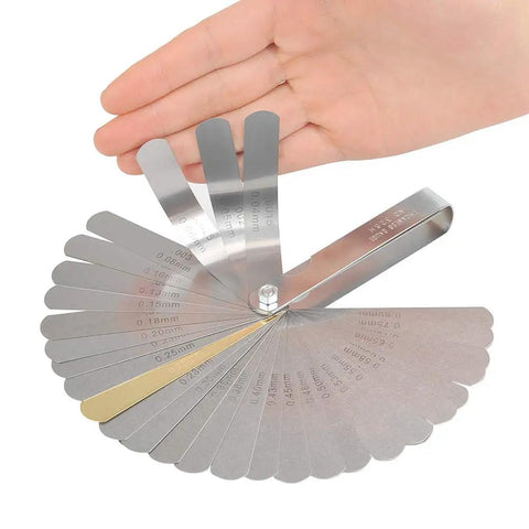 Stainless steel feeler gauge set from Guitar And Bass Setup Pro Tool Kit With 32 Blade Stainless Feeler Gauge Dual Metric And Imperial Markings Radius Gauges Understring Radius Guide Luthier Tools And String Action Ruler For Precise Fretboard And Neck Setup