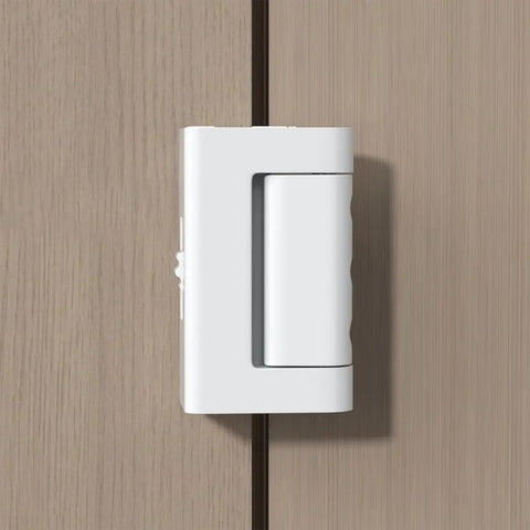 White Adjustable Portable Door Lock Rock Solid Security Reinforcement For Hotels Dorms Lock Down Your Room Bail Proof Tuff Travel Gear For Apartment Safe Setup mounted on a wooden door.