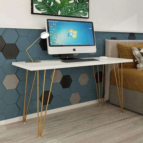Heavy Duty Hairpin Table Legs Non Slip Pads Rock Solid Build support a modern desk setup with a computer and lamp.
