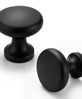 Slick Matte Black Cabinet Knobs Paired With Heavy Duty Smooth Glide Drawer Pulls 25 Pack built like a tank solid zinc alloy 1.2 inch profile.