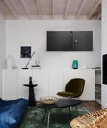 Built Tough Metal Wall Cabinet With Lockable Doors For Kitchen Garage And Office Heavy Duty Steel Wall Storage Chest shown installed in a modern living room.