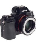Sony camera with 0.71x Focal Length Reducer Speed Booster For Nikon F To Sony E Mount, showing adapter ring attached