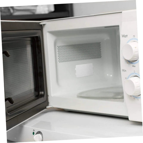 Open microwave showing installed 10 Piece Microwave Mica Sheets Set For Replacement Mica Plates Heat Resistant Insulation