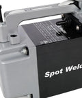 Close-up of Portable Steel Sheet Metal Spot Welder Handheld Welding Tool With Copper Tips, showing handle and label details.