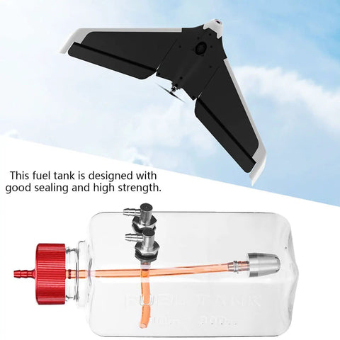Transparent RC Gas Fuel Tank 300ml For 15 26cc Aircraft, showing clear body, leakproof design with orange tubing and red cap.
