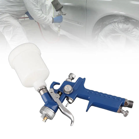 Keenso Pneumatic Paint Spray with Transparent Pot showing blue spray gun with clear paint cup for precise atomization.