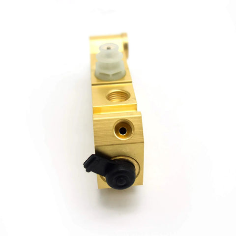 Brass brake proportioning valve PV2, side view with black knob and white plastic fittings