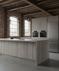 Straight Up Heavy Duty Reactive Water Based Interior Wood Stain Generates A Relaxed Coastal Driftwood Vibe Fully Voc Free Designed For Diy Craftsmen And Renovators Arrives Loaded Inside A Massive Fifty Five Gallon Tub in a modern kitchen setting.