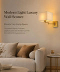 Modern Rectangular Fabric Wall Sconce,Swing Arm Wall Lamp,3 Color Lighting styled next to a sofa in a cozy living room.