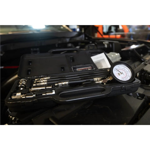 Mityvac MV5530 Engine Compression Test Kit in a black carrying case with metal adapters and 2-3/4 in. Bourdon gauge