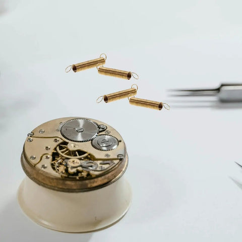 Clock Tension Springs Replacement Kit For Wall Clocks And Alarm Clocks with alloy springs and clock mechanism in view