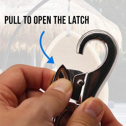 Close-up of hand opening Beefy 1000Lb Swivel Hook for Hanging Chairs and Hammocks, 360 Degree Snap Action, indoor outdoor use.