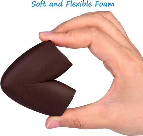 Eight Pack Baby Proofing Corner Guards Kid Safe Soft Rubber Edge Protectors with 3M Adhesive held in hand, showing flexibility.