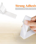 Heavy Duty Self Adhesive Mounting Tape Rolls With Rock Solid Industrial Strength Sticky Back Strips and Reusable Double Sided Loop Fastener For Indoor Outdoor Use and Home Fixes, showing strong adhesive in use.
