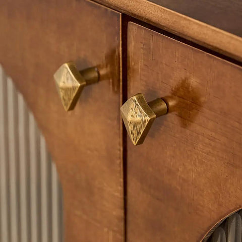 Antique Bronze Cabinet Knobs And Drawer Pulls Two Pack With Boho Geometric Silhouettes on wooden cupboard close-up.