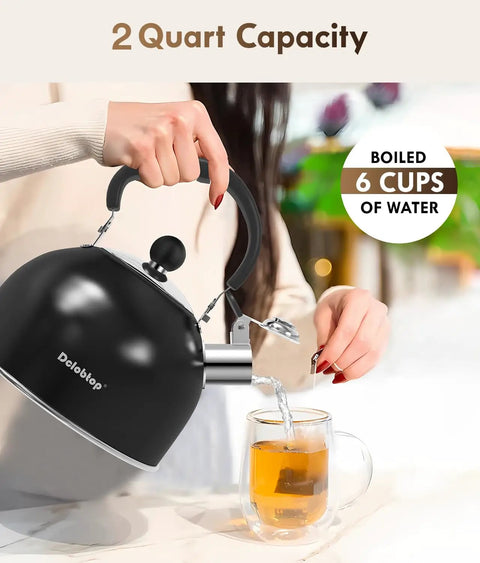 Pouring tea with Stovetop Stainless Steel Tea Kettle With Loud Whistle 2 Quart Teapot Ergonomic Handle Classic Black Finish
