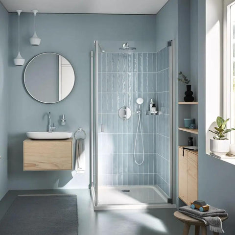 Modern bathroom with Essentials 24 Inch Wall Mounted Towel Bar In Starlight Chrome Durable Brass Construction Smooth Finish