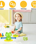 Tot Approved Montessori Math Learning Kit Featuring Dope Frog Shaped Pieces To Boost Preschool Numeracy Foundation, kid playing with frog scale.