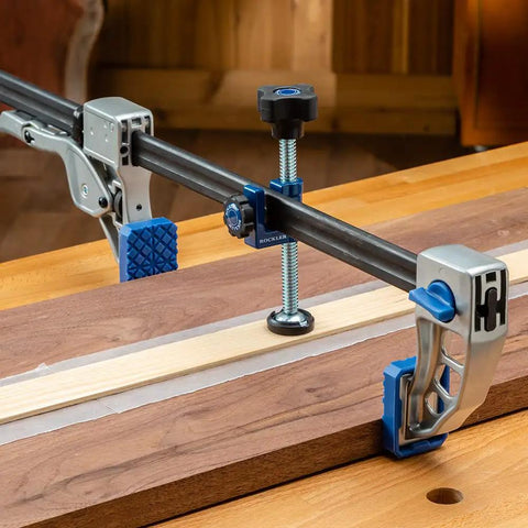 3-Way Clamp Attachment For F-Style Clamps With Single Screw in use on a wooden workbench for woodworking projects