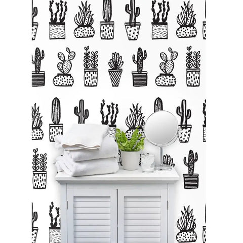 Heavy Hitter Commercial Wallpaper Featuring Bold Botanical Prints And Soft Linen Texture, Pvc Free Paste To Paper Wallcovering Built Different For High Traffic Spaces on a shelf with towels.