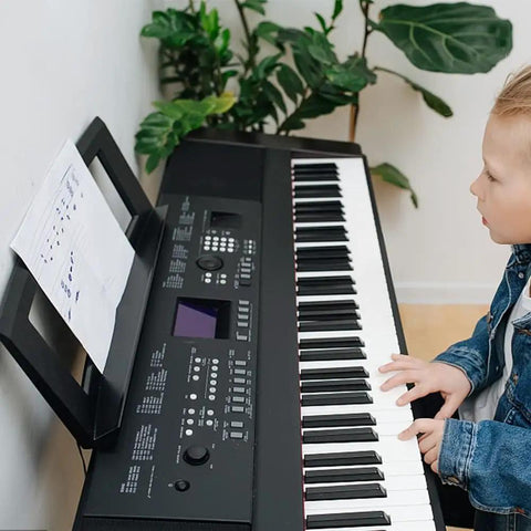 Child using Sheet Music Stand For Keyboard Players, Rock Solid, Durable And Adjustable, Clip And Height Easily Adjustable