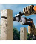Knockout Impact Drill Packing 810 Watts And A Beefy 13 Mm Chuck Featuring Variable Speed Control penetrating wood for DIY projects.