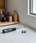 Workhorse Hydraulic Brake Insert Kit components, including oil needle connector, screwdriver, and fittings on white surface
