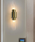 Sleek Modern Wall Sconce Lights With Heavy Duty Stainless Steel Build Top Shelf Indoor Outdoor Up Down Led Wall Lamp For Bedroom Living Room Bathroom Decor close-up of stylish gold wall sconce.