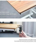Grab And Go Rolling Laptop Desk Stand With Locking Wheels Adjustable Mobile Workstation Table For Bed Couch Gaming Or Living Room Smooth Ride Chill Spot Flat Surface, close-up of oak surface and measuring thickness.