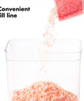 Keep It Fresh With Airtight Pop Containers, 4.4 Qt Capacity, Stackable Dry Food Storage being filled with grains