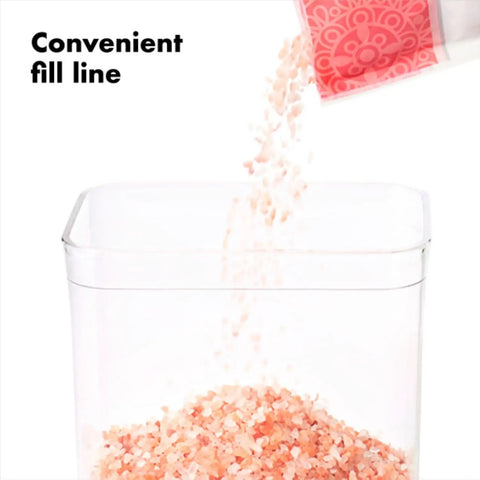 Keep It Fresh With Airtight Pop Containers, 4.4 Qt Capacity, Stackable Dry Food Storage being filled with grains