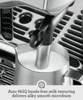 Oracle Fully Automatic Espresso Machine In Brushed Stainless Steel With 58 mm Portafilter Integrated Grinder And Slick Milk Frother showing Auto MilQ hands-free milk frothing tool.