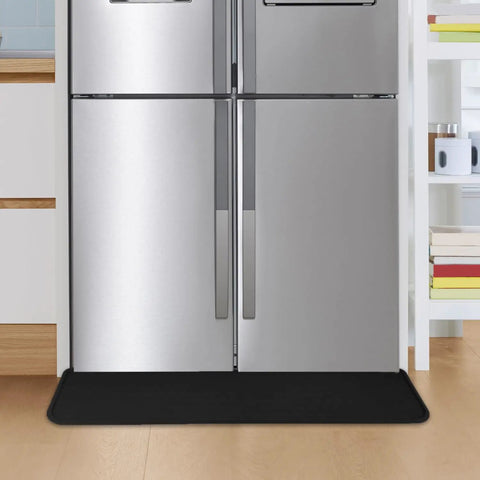 Heavy Duty Fridge Drip Pan And Leak Catcher Mat To Shield Floors From Watery Messes And Keep Your Place Bone Dry Non Slip Silicone Appliance Mat For Washer Or Freezer In Tough Black under a silver refrigerator.