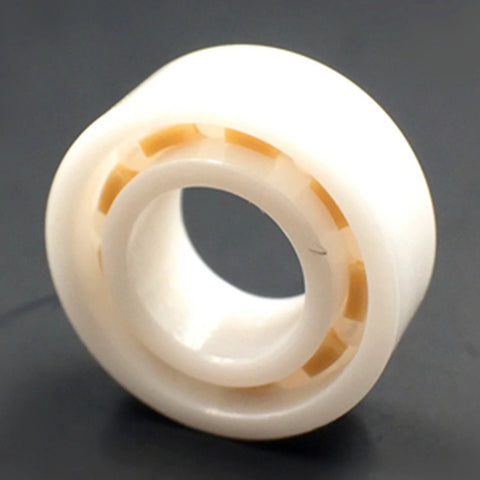 R188 full ceramic ball bearing with white housing and orange separators, 1/4in x 1/2in x 3/16in