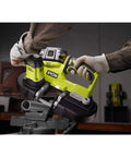 OneAnd 18V Cordless Compact Band Saw 2-1/2 Inch Capacity Tool Only P590 being used to cut metal pipe in workshop