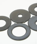 Rock Solid Insert Ring Set For Router Table Upgrade Hella Durable with five black rings, sizes 0.5 to 1.5 inches, woodworking accessory.