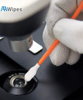 Top Tier One Hundred Count Four Inch Cleaning Swabs In Orange Knitted Polyester Heads used for cleaning a microscope lens.