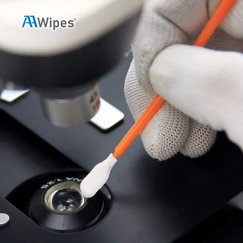 Top Tier One Hundred Count Four Inch Cleaning Swabs In Orange Knitted Polyester Heads used for cleaning a microscope lens.