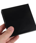 Black PVC Accordion Bellows Cover For CNC Milling Machines 4x4 Inch being held, showcasing sleek industrial design