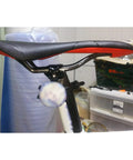 Close-up of Titanium Seatpost Ear Clamp Kit For Oval Carbon Rails 7x9 Bolt CNC Machined Aluminum Clamp on bike