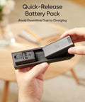 Hands holding quick-release battery pack for Dual Camera Video Doorbell With Local Storage 2K FHD Head To Toe Front And Downward Views.