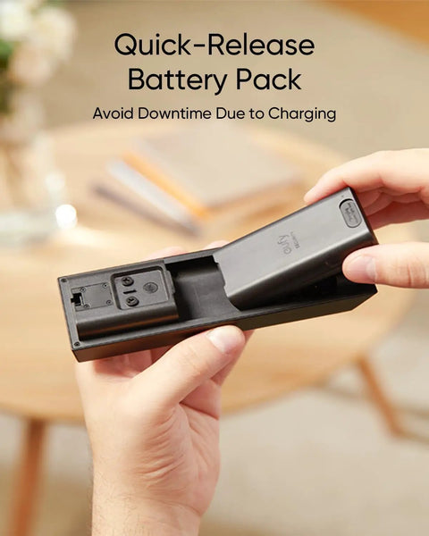 Hands holding quick-release battery pack for Dual Camera Video Doorbell With Local Storage 2K FHD Head To Toe Front And Downward Views.