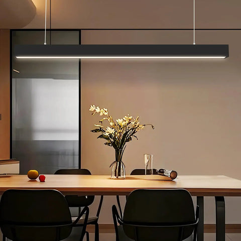 Top Shelf 4 Ft Linear Led Pendant Light With Smooth Remote Control Adjustable 3000K To 6000K Color Temperature Killer Glow For Offices Shops And Home Modern Black Housing in a modern dining area.