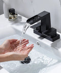 4 Inch Centerset Waterfall Bathroom Faucet With Two Handles, 3 Hole Basin Setup, Pop Up Drain With Overflow, Lavatory Mixer Tap, Go To Vanity Faucet Slick Matte Black Finish, water flowing into hands.