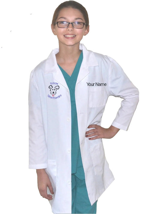 Kids Veterinarian Lab Coat With Embroidered Name And Puppy Embroidery White Size 12/14 Unisex 3 Pockets 65 Percent Polyester And 35 Percent Cotton Machine Washable Realistic Vet Role Play Outfit For Aspiring Pet Doctors worn by a child