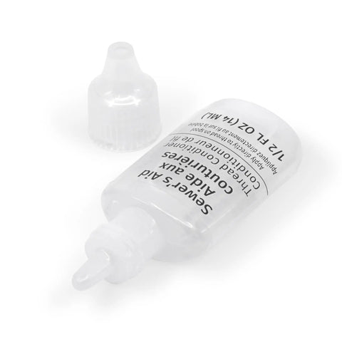 Sewer Aid Liquid Lubricant For Your Sewing Setup 0.5 Fluid Ounce Clear Non Staining Formula For Needles Spools Bobbins Presser Feet And Scissors Blades Keeps Sewing Smooth And Fabric Penetration Easy. clear bottle and cap