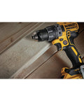 Compact 20V Max XR Li Ion Brushless Drill And Driver With Dual Speed Settings shown in action on wood surface