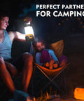 Rechargeable LED Camping Lantern with 1000 Lumens lighting a campsite with people relaxing by a fire.
